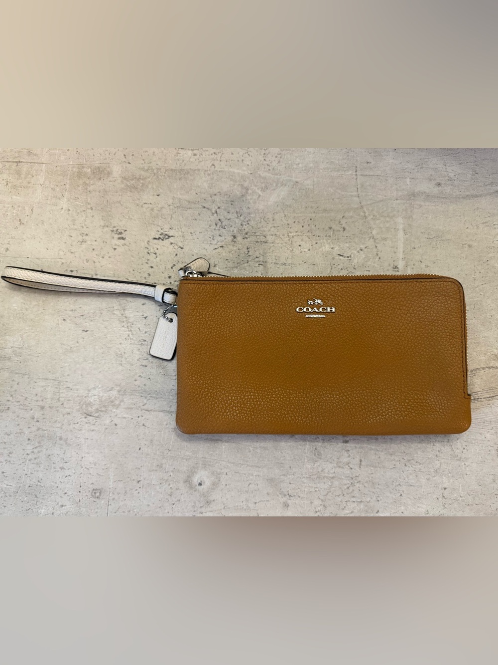 Coach Pebbled Leather Wristlet in Tan and White